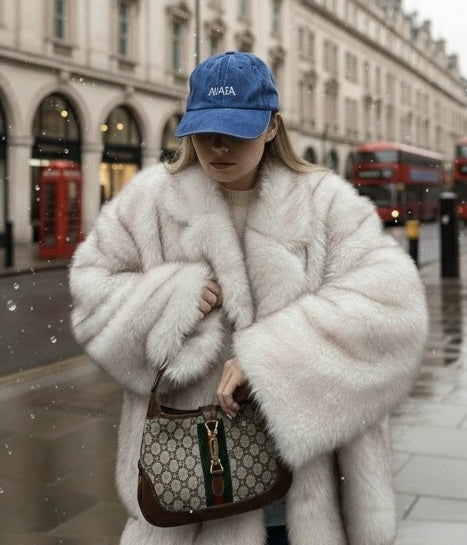 Why a Beige Faux Fur Coat Is the Ultimate Winter Luxury Piece
